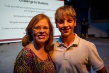 Image of attendees and students at the collegiate school commissioning ceremony