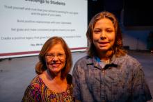 Image of attendees and students at the collegiate school commissioning ceremony