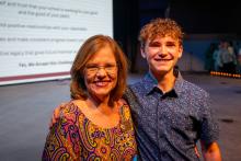 Image of attendees and students at the collegiate school commissioning ceremony