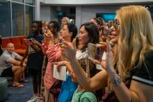 Image of attendees and students at the collegiate school commissioning ceremony