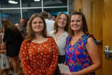 Image of attendees and students at the collegiate school commissioning ceremony