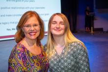 Image of attendees and students at the collegiate school commissioning ceremony