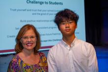 Image of attendees and students at the collegiate school commissioning ceremony